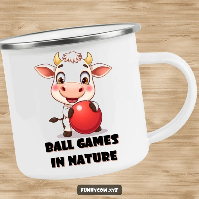 Funny camping mug showing a happy cow with oversized eyes, enthusiastically bouncing a big red ball, ideal for outdoor fun.