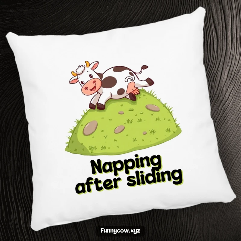 Funny pillow depicting a cow joyfully sliding down a grassy hill on its behind, a soft and humorous accent.